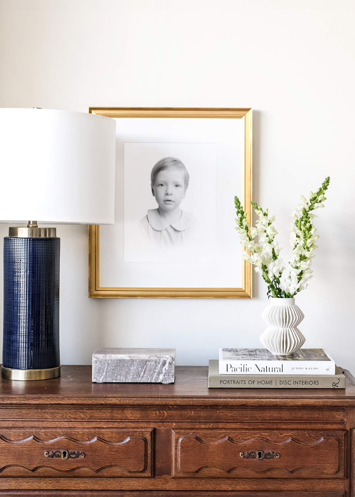 a picture frame on a wall of heirloom portrait by photographer Caroline Eidson | Photographers in Tulsa OK